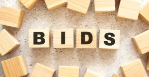 bid management spelt out on wooden blocks