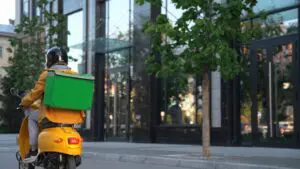 deliveroo driver on motorcycle