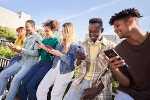 people using mobiles
