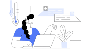 a worker sat at their desk making a cold call