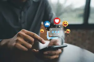 man holding mobile on social media