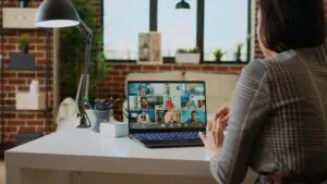 group of people on a call on a laptop