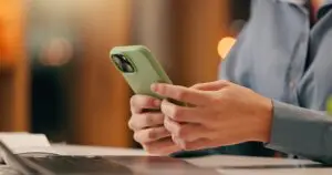 man holding mobile phone