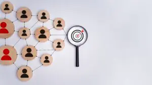 network of audience with magnifying glass highlighting target audience