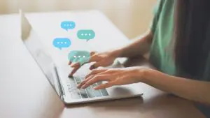 woman using slack to send a work message