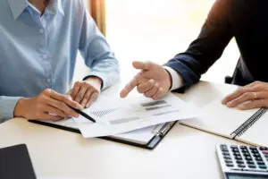 two people working out a business case 