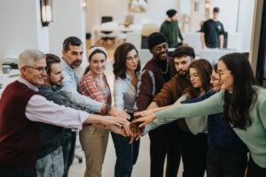 company employees working together showing a positive company culture