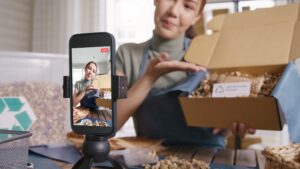 How to boost your organic reach on social media 2 content creator creating content on phone