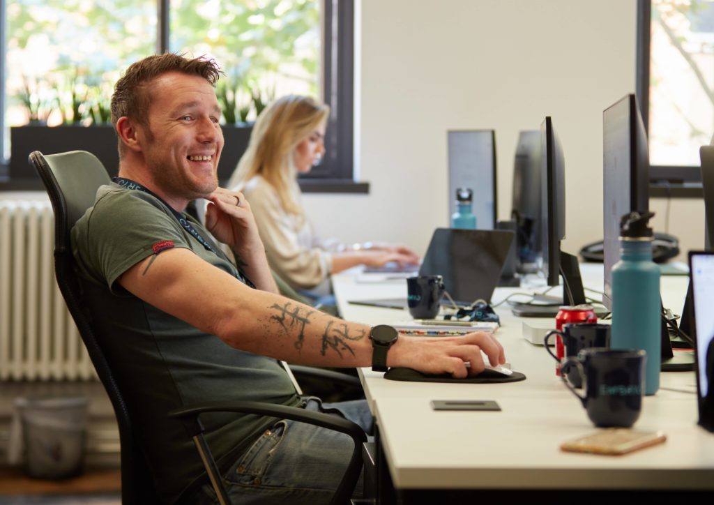 Emma and Danny working in Embryo's head office