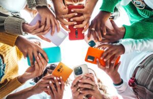 people using their mobile phones in a circle