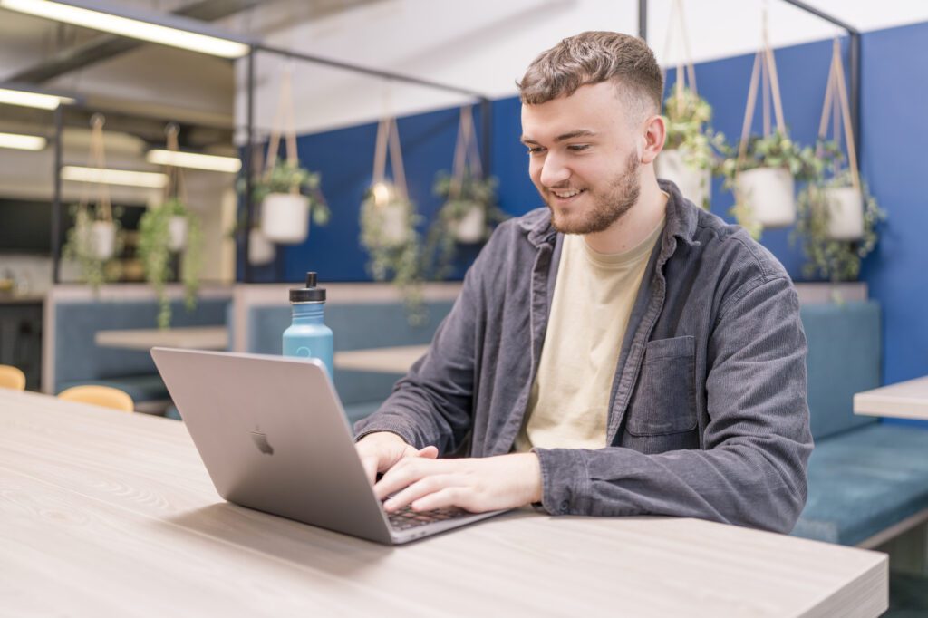 Head of Embryo's PPC team Callum Leonard working in the office