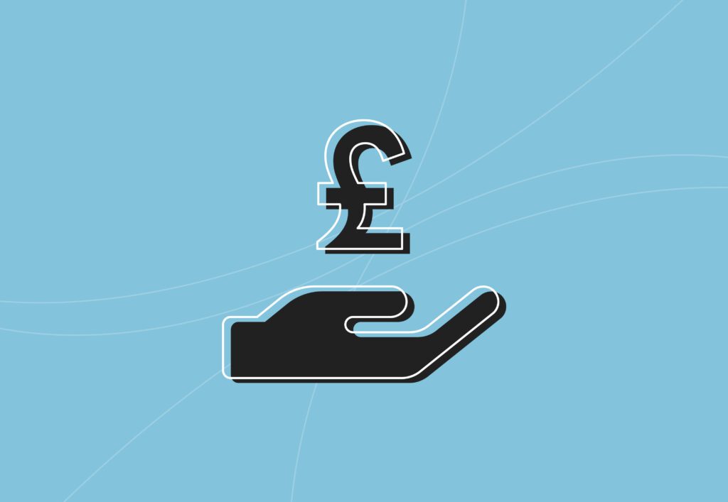 hand holding a pound sign, representing paid social budgeting