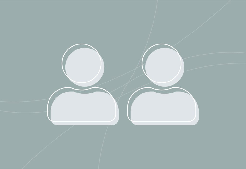 Two icons of people representing user intent and how it differs between organic and local SEO