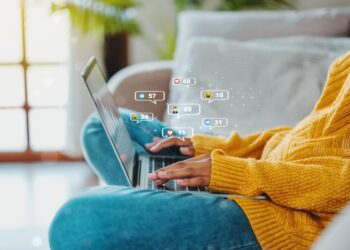 Social media audit 7 women using social media on laptop