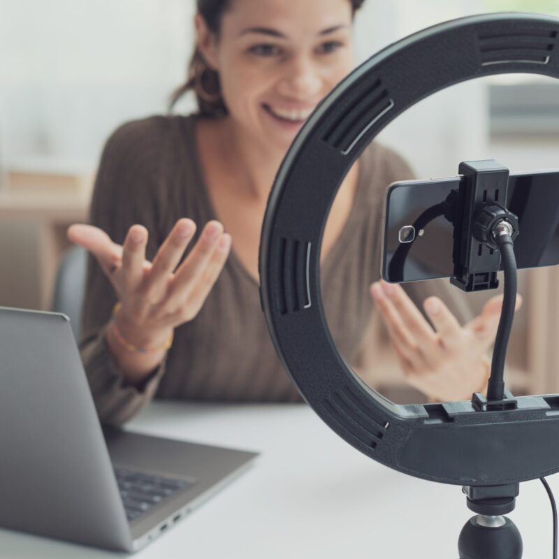 woman filming a social media video for tiktok