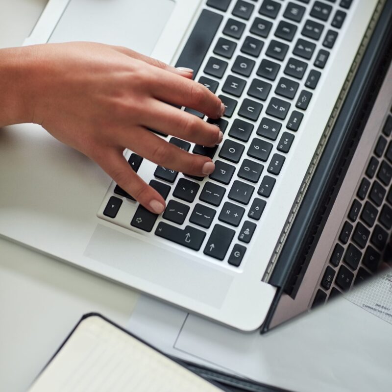 SEO 19 person working on website content on laptop