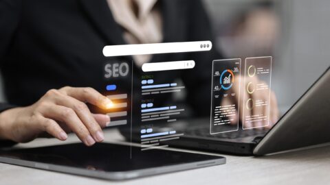 person working on seo on laptop