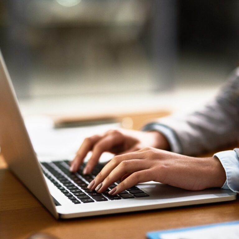 Social media for e-commerce businesses 10 laptop,,email,and,hands,of,a,person,at,a,desk