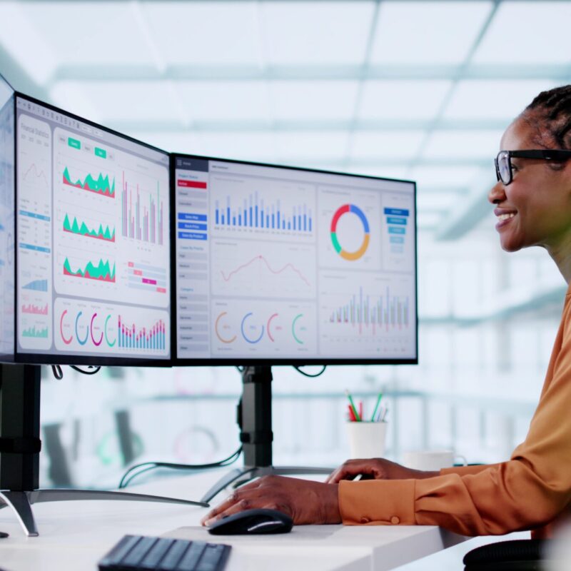 Marketing Strategy 5 woman tracking and reporting data