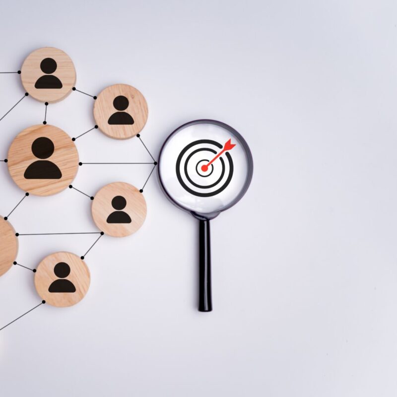 Facebook Advertising 9 magnifying glass over target board representing a target audience