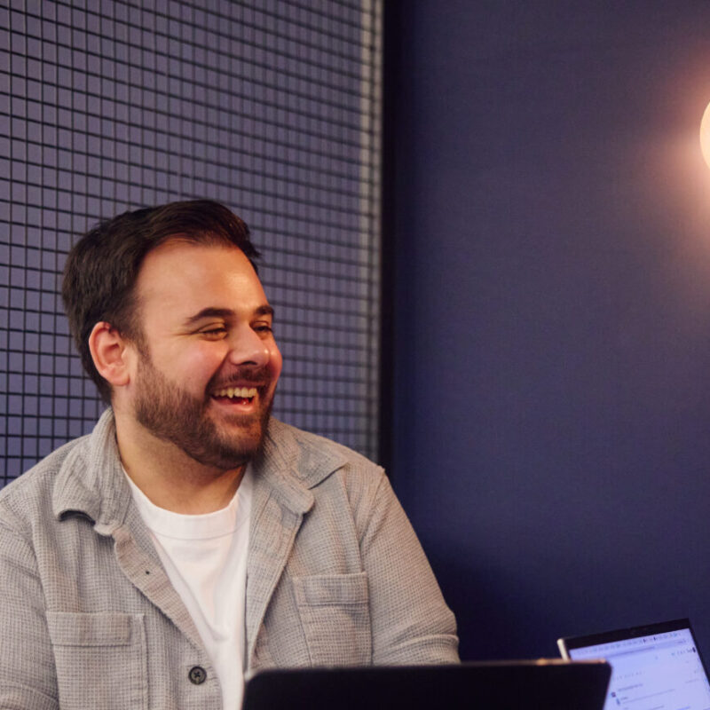 A Guide to the Different Types of PR and Their Benefits 4 sam thomas laughing and working in the embryo manchester office